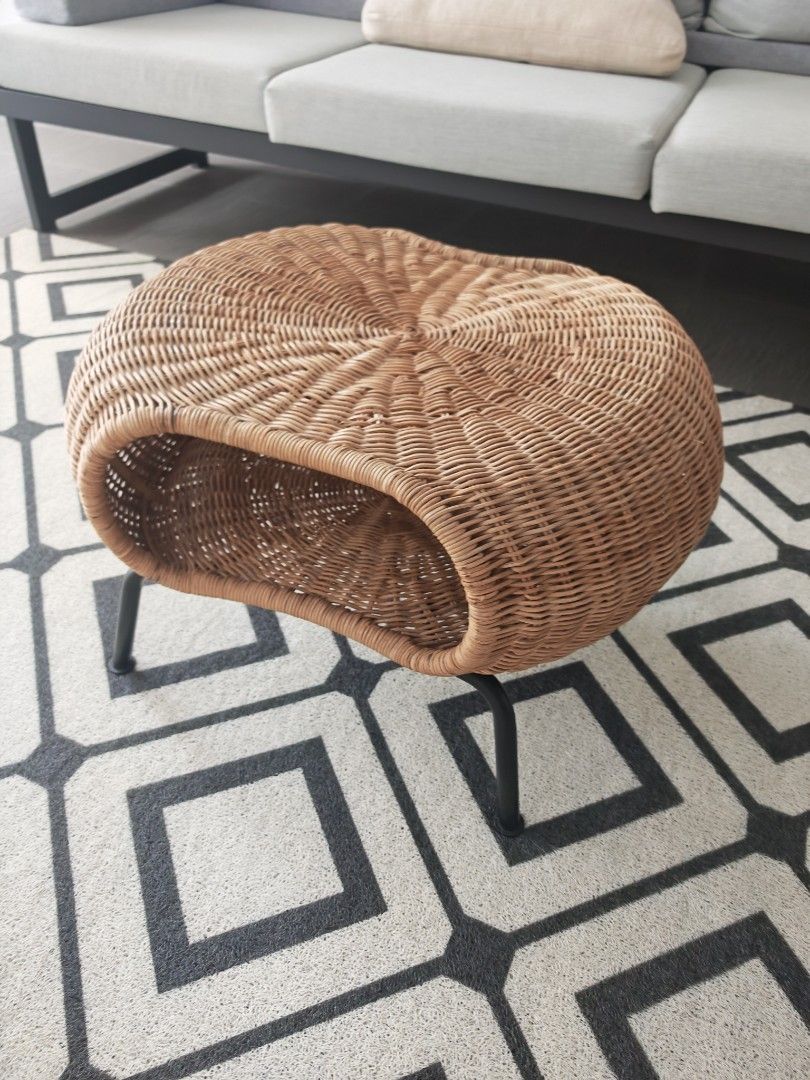 Rustic Storage Stool Coffee table (Category: Chairs) located in Singapore. Submitted by positive_vibe (Listing ID 1466782850, Image 3). Description: - Woven rattan with built-in storage cubby - IKEA Gamlehult original price $130. - Stylish and sturdy dark metal hairpin legs - Earthy brown natural material complements bohemian or modern decor - Versatile use as an extra seat, footrest, coffee table or small pet cave.