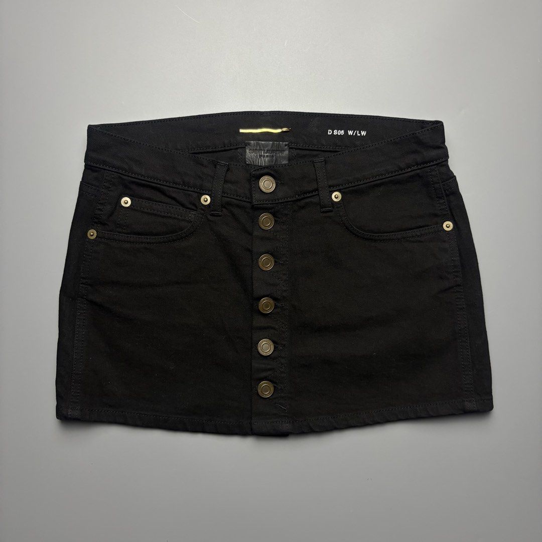 Sainth Laurent By Hedi Slimane Button Down Skirt (Category: Skirts) located in Dinalupihan. Submitted by hell.thrift (Listing ID 1466901039, Image 1). Description: Sainth Laurent By Hedi Slimane Button Down Skirt Length: 11.5 Waistline:14 Can fit size:28 No issue As New.