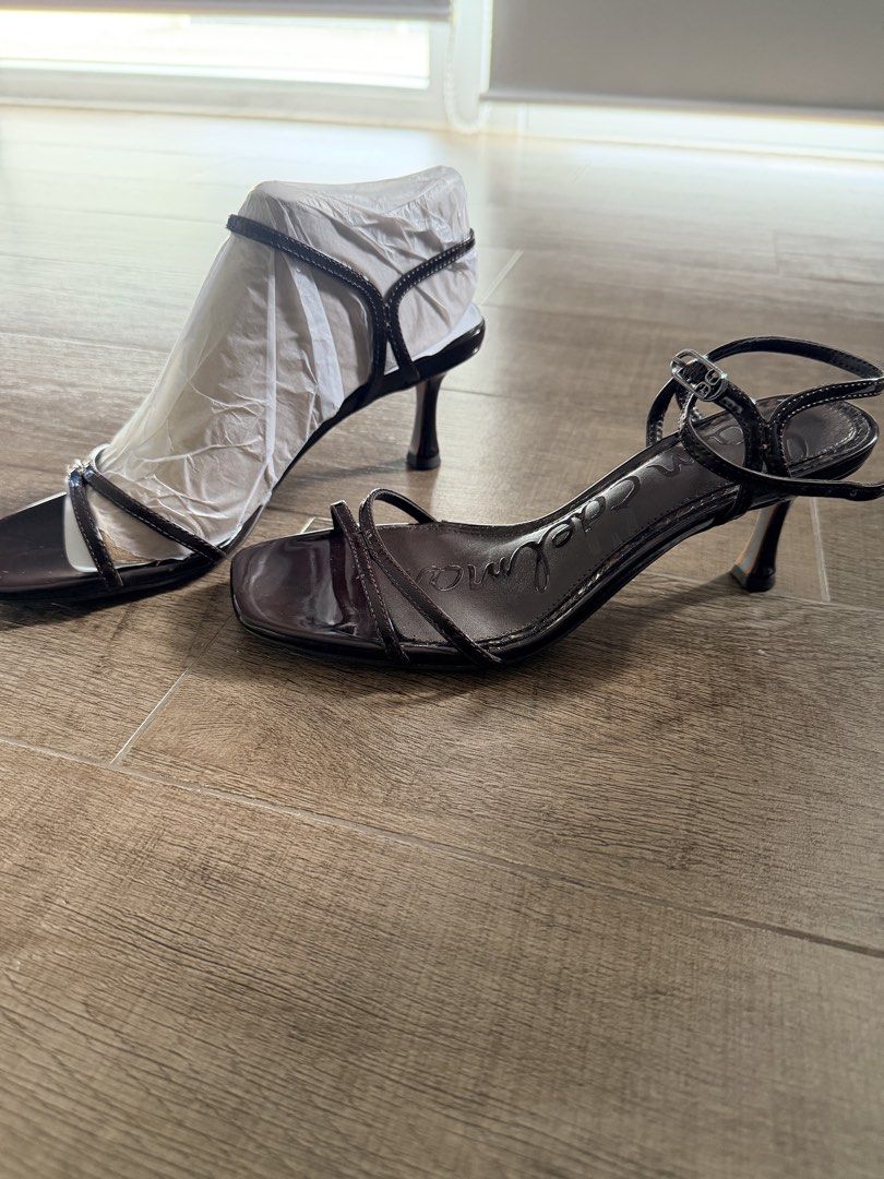 Sam Edelman Presley Patent Brown Sandals Heels (Category: Heels) located in Taguig. Submitted by mrs.k.see (Listing ID 1466844962, Image 2). Description: Sam Edelman Presley heels in dark brown patent leather. Strappy design with square toe and slim kitten heel. Ankle strap with buckle closure. Size US 6.5 / EUR 36.5. Pristine soles with stickers still attached, paper stuffing inside. Never worn..