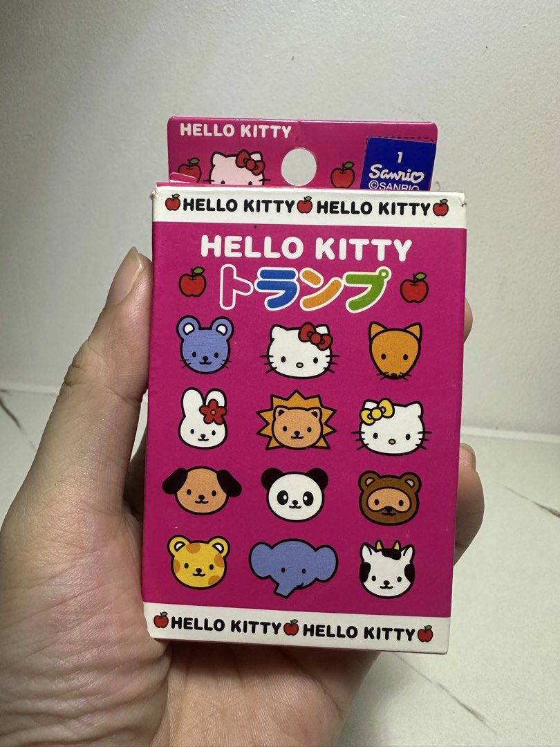 Sanrio Hello Kitty Trump Playing Cards Deck (Category: Board Games & Puzzles) located in Quezon City. Submitted by swift.thriftz (Listing ID 1466890602, Image 1). Description: - Official Sanrio Kitty deck of playing cards - Comes in an adorable pink storage box - Features Kitty and cute animal characters - Includes standard suits (hearts, clubs, diamonds, spades) and jokers - Vibrant and colorful graphics on every card - Great addition to any San
