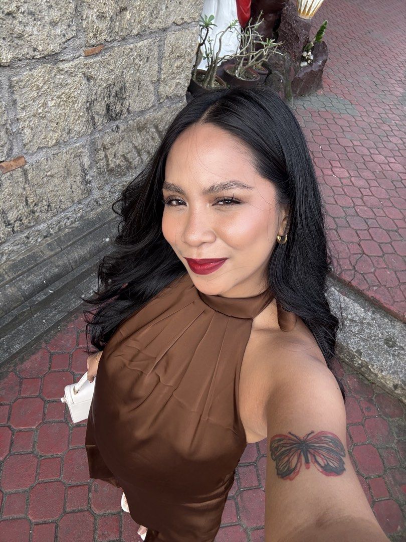 Satin Brown Halter Neck Maxi Dress (Category: Dresses) located in Quezon City. Submitted by danayuhhh_ (Listing ID 1466781127, Image 2). Description: - Color: Rich chocolate brown - Style: Halter neckline, open back with tie closure, floor-length - Material: Smooth satin with a subtle sheen - Condition: Excellent, worn once for a wedding - Occasion: Ideal for evening parties and formal events - Mode of Payment: bank transfer preferred - Shipping: