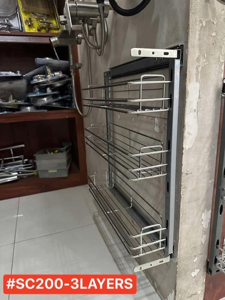 SC200-3Layers Pull Out Kitchen Spice Rack Basket (Category: Food Organization & Storage) located in Manila. Submitted by jamfrimzy089458 (Listing ID 1466833284, Image 3). Description: - Model: SC200-3Layers pull-out spice rack for kitchen cabinets - 3 tiers of durable chrome wire baskets - Sturdy grey frame equipped with smooth sliding tracks - Dimensions: approx. 150mm (W) x 470mm (D) x 550mm (H) - Keeps spice jars and bottles neat and easily ac