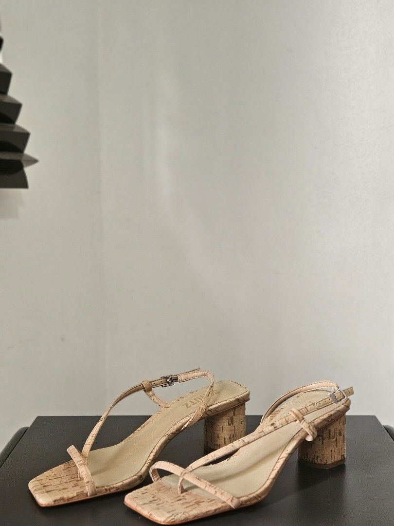 Schutz Heloise Mid Block Cork Sandals (Category: Flats & Sandals) located in Quezon City. Submitted by angelafrancescarasos (Listing ID 1466922339, Image 2). Description: - Brand: Schutz - Style: Heloise Mid Block Cork Sandals - Color: Nude - Size: 6.5 US Women's - Details: Strap style with buckle closure, square toe design, leather sole, made in Brazil - Condition: Good, with a few minor scratches on the heel as shown in photos (No box included)