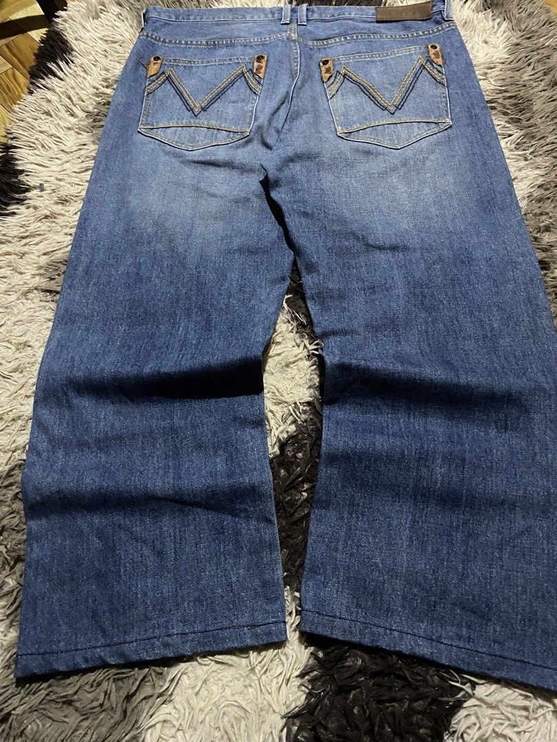 Sean John Blue Denim Jeans Size 34 (Category: Jeans) located in Caloocan City. Submitted by remythrift (Listing ID 1466912505, Image 1). Description: - Brand: Sean John - Size: 34 - Material: 100% Cotton - Color: Medium blue wash with subtle factory fading - Fit: Straight leg - Details: Signature 'M' back pocket stitch with metal accents and branded black waist button - Condition: Excellent pre-loved condition.
