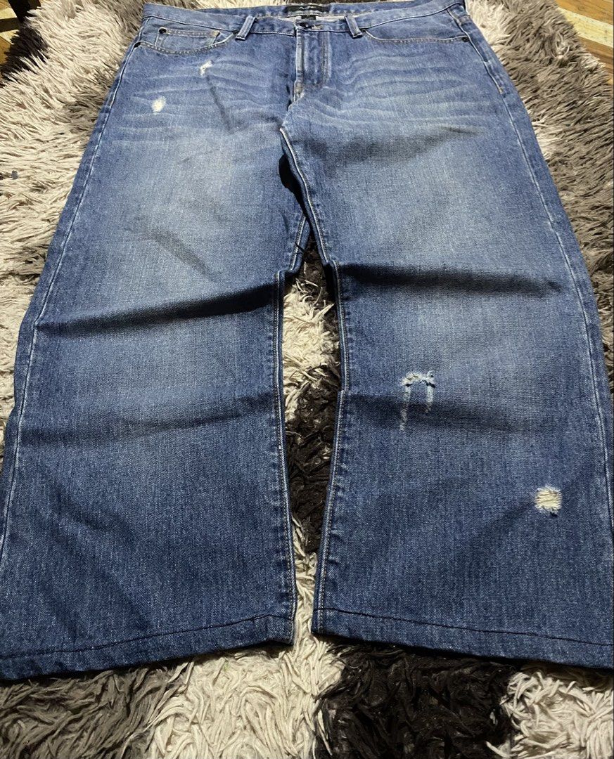 Sean John Blue Denim Jeans Size 34 (Category: Jeans) located in Caloocan City. Submitted by remythrift (Listing ID 1466912505, Image 3). Description: - Brand: Sean John - Size: 34 - Material: 100% Cotton - Color: Medium blue wash with subtle factory fading - Fit: Straight leg - Details: Signature 'M' back pocket stitch with metal accents and branded black waist button - Condition: Excellent pre-loved condition.