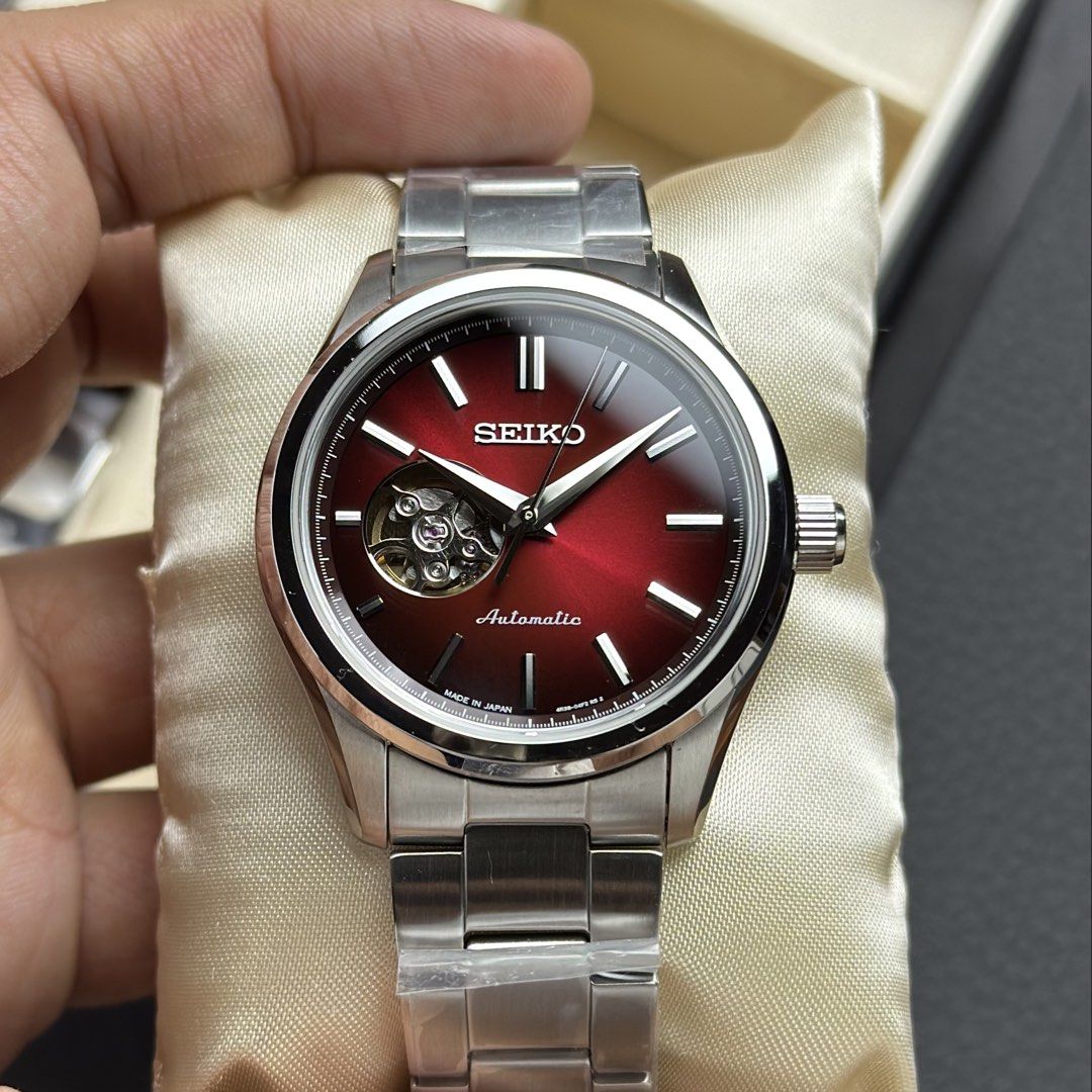Seiko Open Heart Deep Red Dial HFB006| HFB006J (Category: Men's Watches) located in Manila. Submitted by geraaardtorres (Listing ID 1466892192, Image 1). Description: Brand New JDM Seiko Selection Open Heart – Deep Red Dial HFB006 | HFB006J Japan Market Off-Catalog Specifications: ‣ Caliber 4R38 Automatic with Manual Winding ‣ Approx. 40.0mm Stainless Steel Case ‣ Approx. 41-Hour Power Reserve ‣ 24 Jewels | 21,600 bph / 3Hz ‣ Deep / Wine Red Dial
