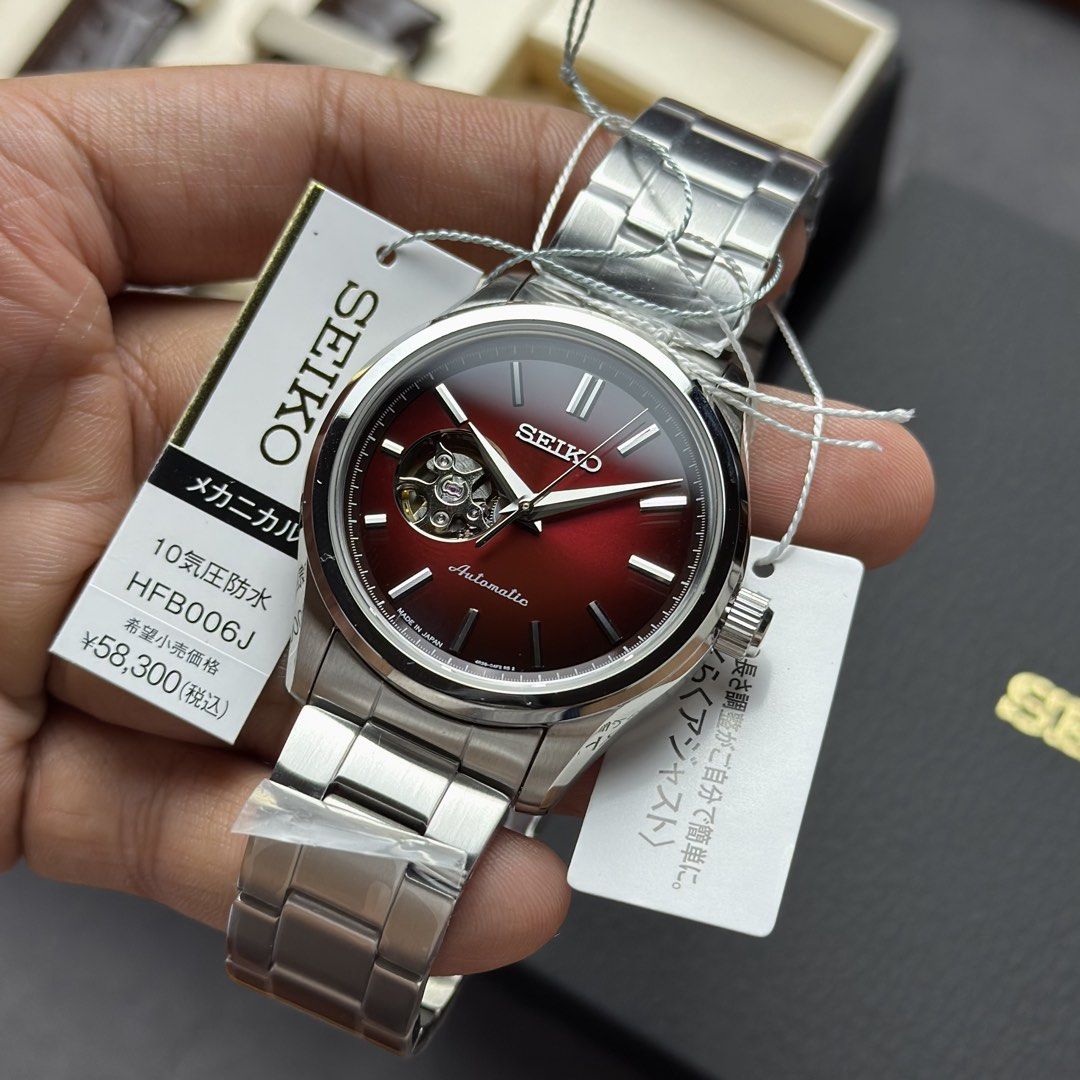Seiko Open Heart Deep Red Dial HFB006| HFB006J (Category: Men's Watches) located in Manila. Submitted by geraaardtorres (Listing ID 1466892192, Image 2). Description: Brand New JDM Seiko Selection Open Heart – Deep Red Dial HFB006 | HFB006J Japan Market Off-Catalog Specifications: ‣ Caliber 4R38 Automatic with Manual Winding ‣ Approx. 40.0mm Stainless Steel Case ‣ Approx. 41-Hour Power Reserve ‣ 24 Jewels | 21,600 bph / 3Hz ‣ Deep / Wine Red Dial