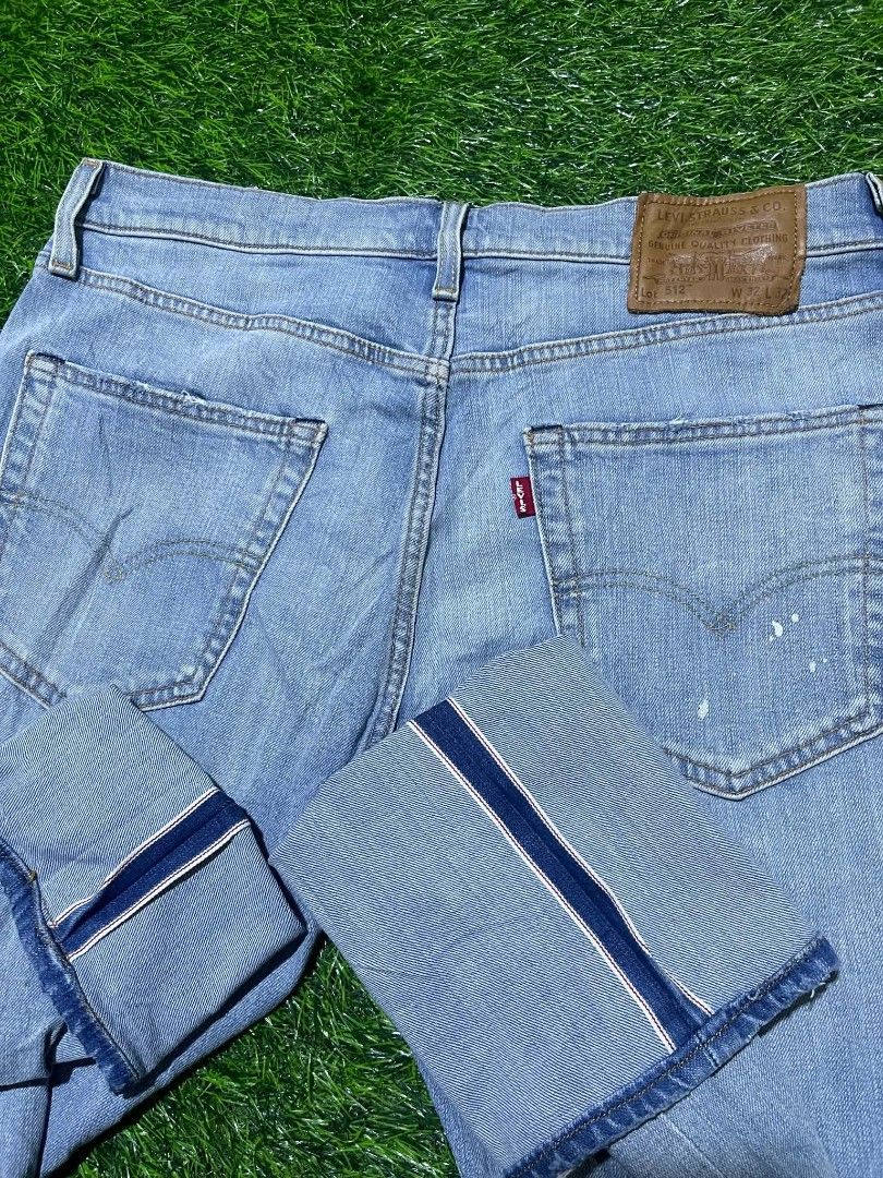Selvedge Levi's 512 Light Wash (Category: Jeans) located in Pangantucan. Submitted by calmwhale_cb83a8 (Listing ID 1466795051, Image 1). Description: - Brand: Levi's - Size: W32 L32 - Wash: Light wash denim with trendy paint splatters - Details: Classic button fly, leather back patch, and iconic red tab - Hem: Cuffed with blue contrast lining - Condition: Durable fabric with stylish pre-existing distress - Style: Casual everyday look.