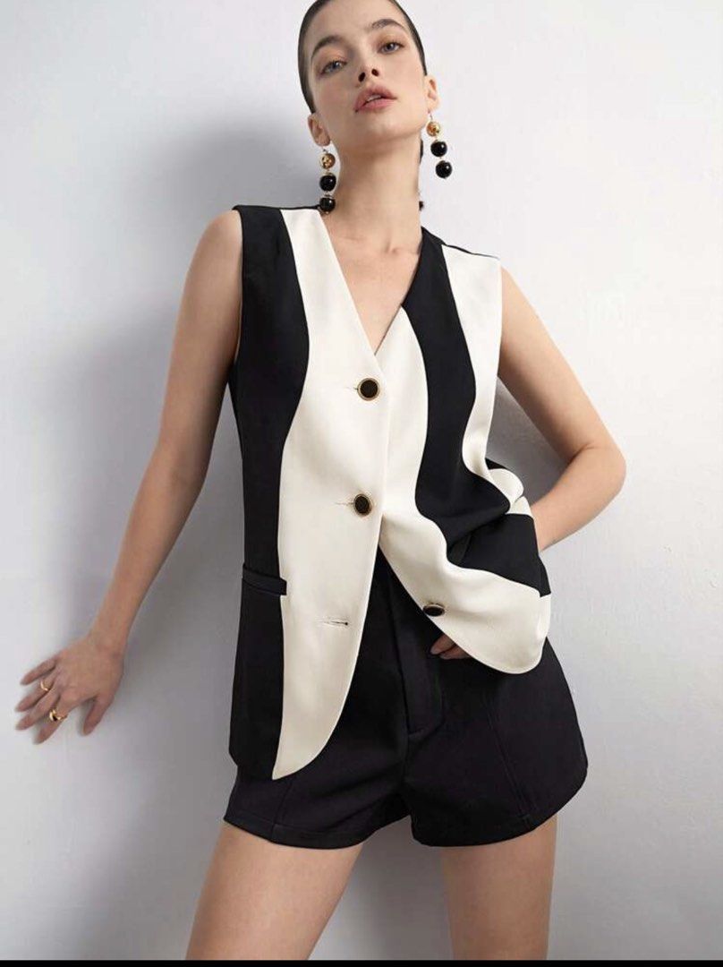 Shein Maija Blazer Top (Category: Sleeveless) located in Quezon City. Submitted by _shopjhcloset (Listing ID 1466931213, Image 1). Description: Shein Vest Top — ₱400 Size: L Color: Black and Off White **Worn once only .