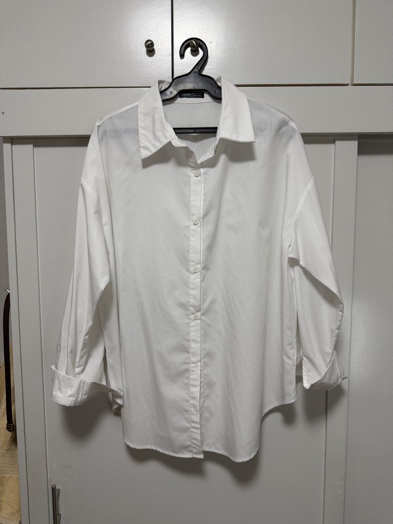 SHEIN White Button-Up Shirt (Category: Shirts) located in Quezon City. Submitted by _shopjhcloset (Listing ID 1466915934, Image 2). Description: Shein BIZWear Button Down — ₱300 Size: XL Color: White **In good condition, no stains.