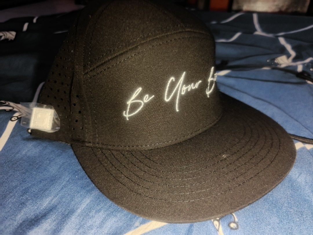 Simpler Be Your Best Black Cap 5 pannel (Category: Caps & Hats) located in Manila. Submitted by julianivan50757 (Listing ID 1466954004, Image 3). Description: - Brand: Simpler - Color: Black with white embroidered 'Be Your Best' text - Breathable: Perforated mesh side panels for extra airflow - Details: Branded taping lines the inside seams - Style: Flat brim.