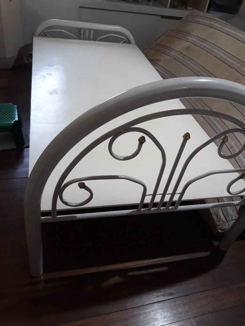 Single bed frame (Category: Bed Frames & Mattresses) located in Manila. Submitted by reckocamp11574 (Listing ID 1466924461, Image 2). Description: Single bed frame, slightly used, with plywood tops free if need by buyer. The foam and cover not included. If interested, please call or text 09454474260..