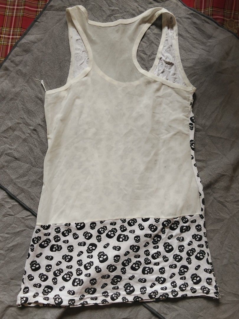 Skull / grunge tank top (Category: Sleeveless) located in Baras. Submitted by lalahdresan (Listing ID 1466780680, Image 2). Description: Selection M-L Issue pinhole Buy as is Limit expectations No return no exchange Jnt SF starts at 54 Thank you for visiting ☺️.