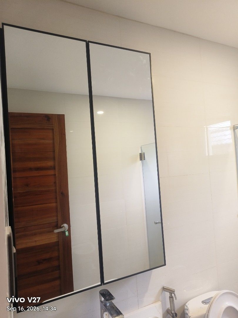 Sliding ghost dooe (Category: Mirrors) located in Manila. Submitted by gentledragon.d3d25e (Listing ID 1466967792, Image 3). Description: - Full-length standing mirror with a sleek black metal frame - Tall rectangular glass for a crystal-clear, full-body reflection - Sturdy, stable build that leans securely against any wall - Clean, modern design that fits any bedroom or living room interior - Note: Heavy item, self-collection only from the void 