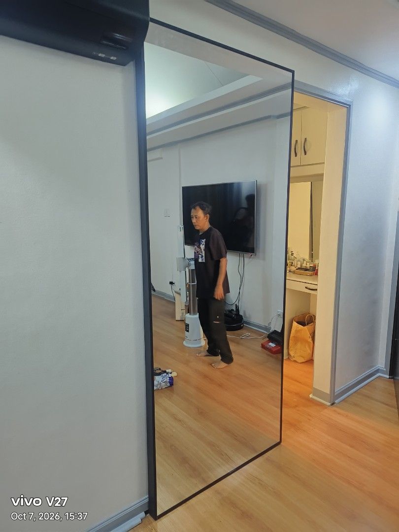 Sliding ghost dooe (Category: Mirrors) located in Manila. Submitted by gentledragon.d3d25e (Listing ID 1466967792, Image 1). Description: - Full-length standing mirror with a sleek black metal frame - Tall rectangular glass for a crystal-clear, full-body reflection - Sturdy, stable build that leans securely against any wall - Clean, modern design that fits any bedroom or living room interior - Note: Heavy item, self-collection only from the void 
