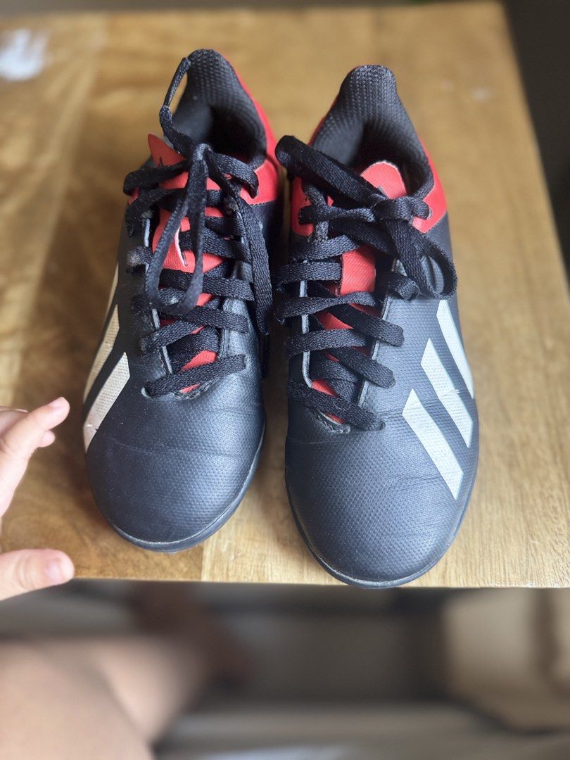 Soccer Shoes (Category: Babies & Kids Fashion) located in Bacoor. Submitted by 3boyskulit (Listing ID 1466908158, Image 1). Description: Selling these Adidas football shoes in black, white, and red. Perfect for football practice, training, or casual sports use.