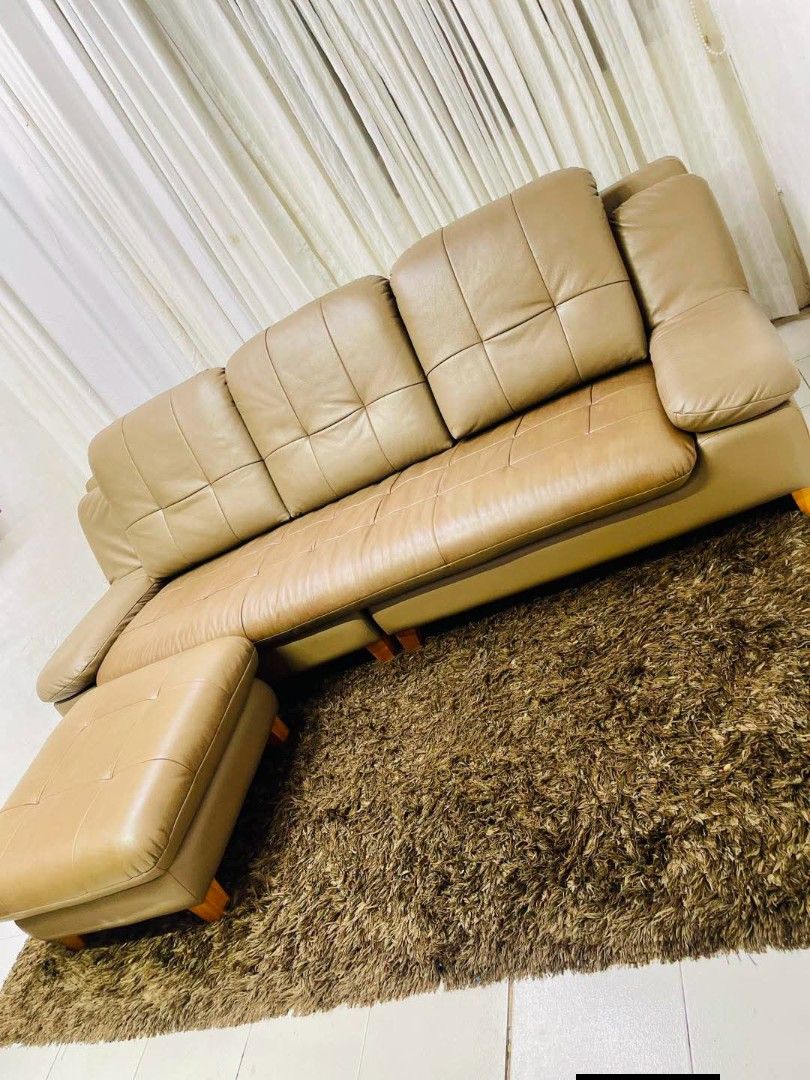 Sofa Set (Category: Sofas) located in Meycauayan. Submitted by marygracecasimiro (Listing ID 1466820004, Image 1). Description: From South Korea Tan Genuine leather 4-to-5-seater sofa and stool set Jakomo Brand Dimension L100x41x37Hx SH: 18 inches Ottoman 29x27xH 18 Get this for only 35k♥️.