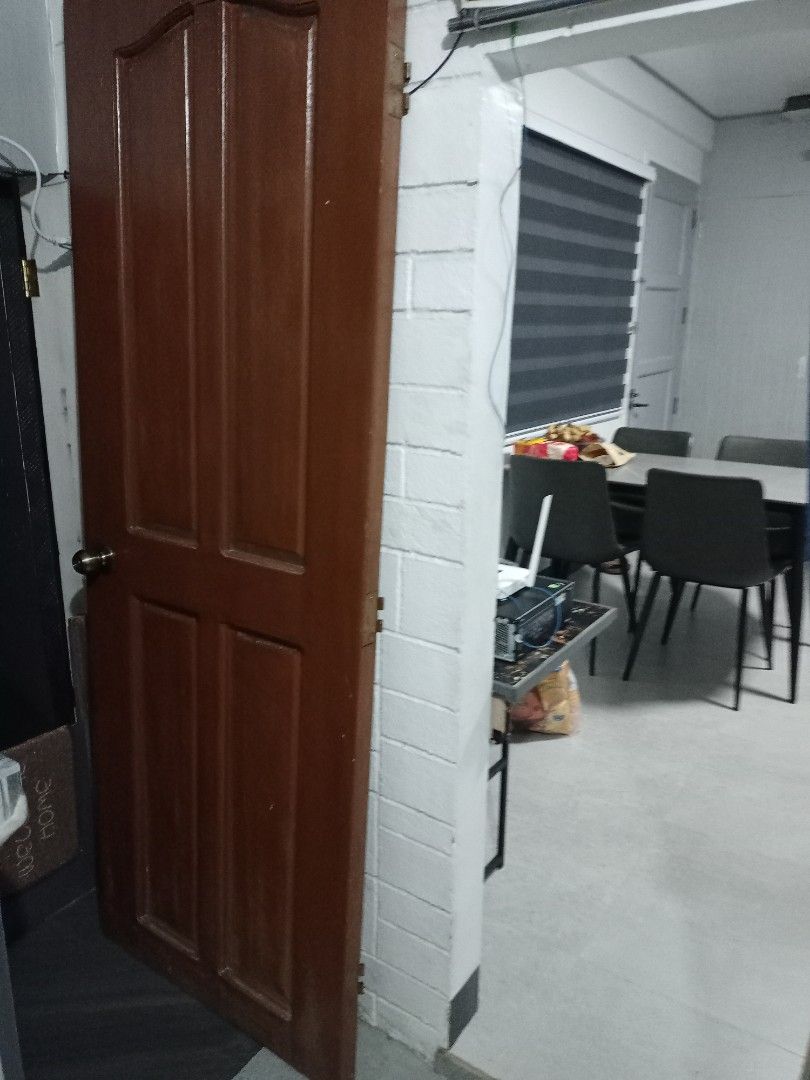 Solid Wood Interior Door with Four Panels and Handle (Category: Locks, Doors & Gates) located in Manila. Submitted by luckyeagle-7ff8 (Listing ID 1466934593, Image 2). Description: Solid wooden door with a rich brown finish and classic four-panel design. Includes a silver-toned metal door knob. L- 77.5 inches/ W-28 inches. with hamba. complete set of door. suitable for interior rooms or entryways. Sturdy build with traditional panel detailing. Re