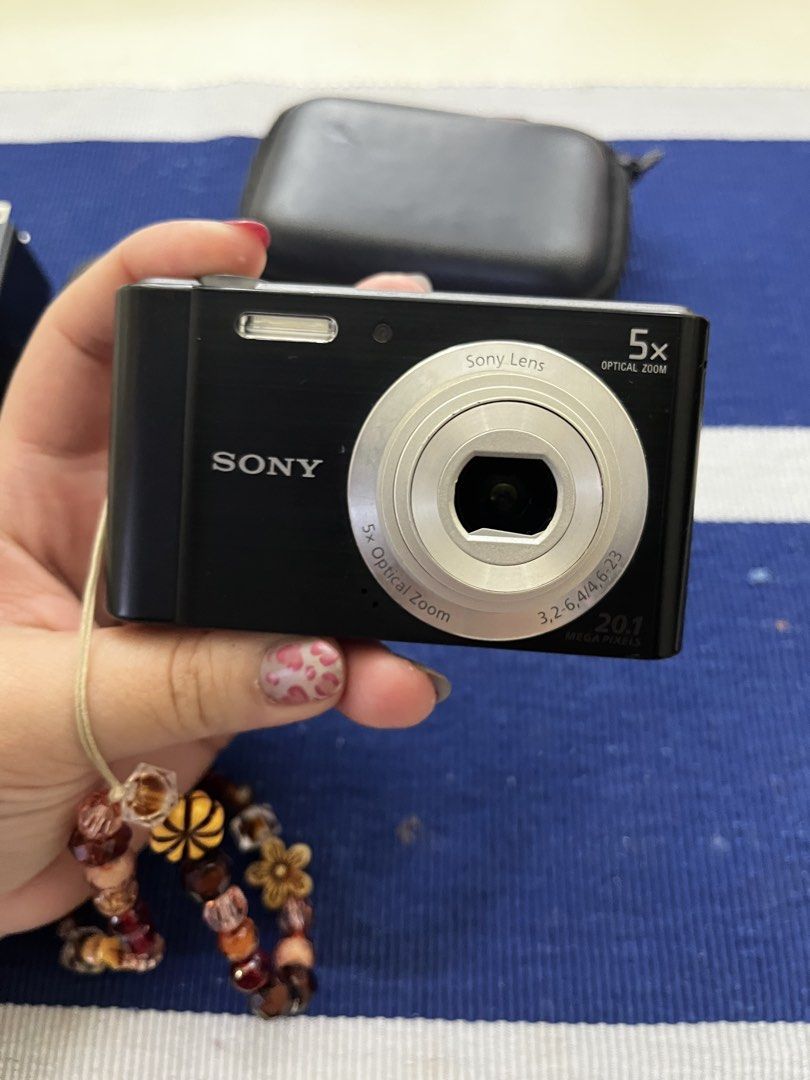 Sony 20.1 Megapixels 5x Optical Zoom Digital Camera (Category: Cameras) located in Marikina City. Submitted by nea_lein (Listing ID 1466863035, Image 2). Description: Cybershot DSC-800 5x Optical Zoom 20.1 MP Inclusions: Camera Case Camera charger (rare) Micro SD adapter -Well used -The camera lens cover doesn’t close, but output not affected -No blackscreen/vignette screen -Working mic -Need to buy a micro sd card, mine is corrupted na :( RFS: -