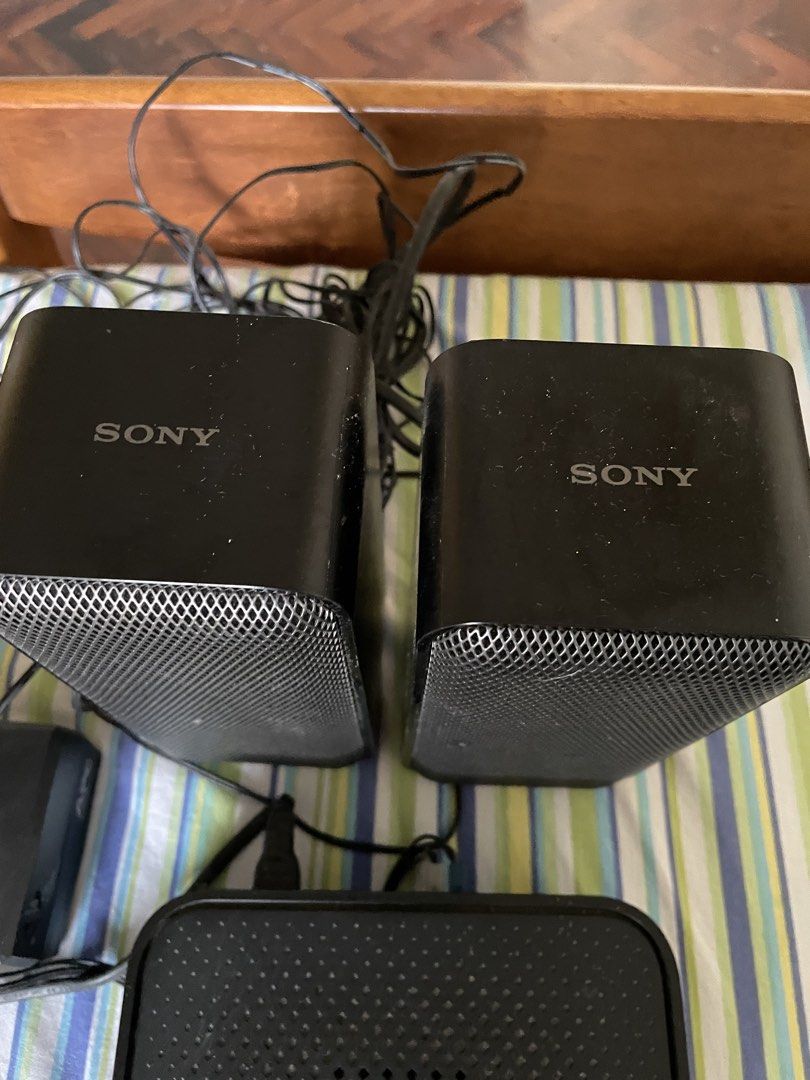 Sony Wireless Amplifier TA-S40RWR with Speakers (Category: Soundbars, Speakers & Amplifiers) located in Cebu City. Submitted by modelrunway (Listing ID 1466855070, Image 2). Description: Sony wireless amplifier model TA-S40RWR. Includes two matching Sony tower speakers with metal mesh grilles. Black finish on all components. Power cables and connection wires attached. Made in Vietnam, 220-240V, 50/60 Hz, 20W power rating. Serial number 2007423. T