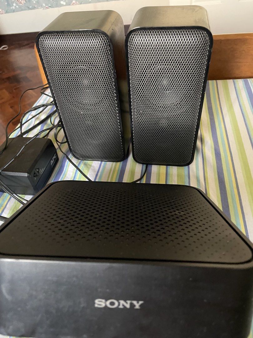 Sony Wireless Amplifier TA-S40RWR with Speakers (Category: Soundbars, Speakers & Amplifiers) located in Cebu City. Submitted by modelrunway (Listing ID 1466855070, Image 1). Description: Sony wireless amplifier model TA-S40RWR. Includes two matching Sony tower speakers with metal mesh grilles. Black finish on all components. Power cables and connection wires attached. Made in Vietnam, 220-240V, 50/60 Hz, 20W power rating. Serial number 2007423. T