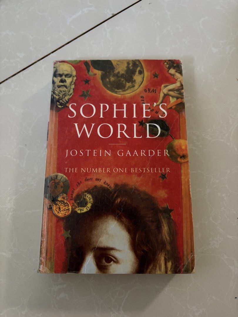 Sophie’s World (Category: Storybooks) located in Las Pinas. Submitted by bibliomomma (Listing ID 1466790624, Image 1). Description: Sophie’s World by Jostein Gaarder Authentic book! Slightly tanned pages, creasing on the spine, intact pages, no foxing MOP Gcash.