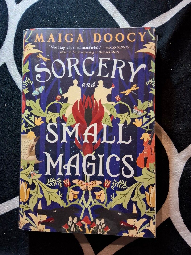 Sorcery and Small Magics by Maiga Doocy (Category: Storybooks) located in Quezon City. Submitted by chlochloerine (Listing ID 1466877465, Image 1). Description: queer / achillean / mlm fantasy novel rfs: decluttering / duplicate copy mop: maribank mod: lbc (sf will be shouldered by the buyer) loc: qc.