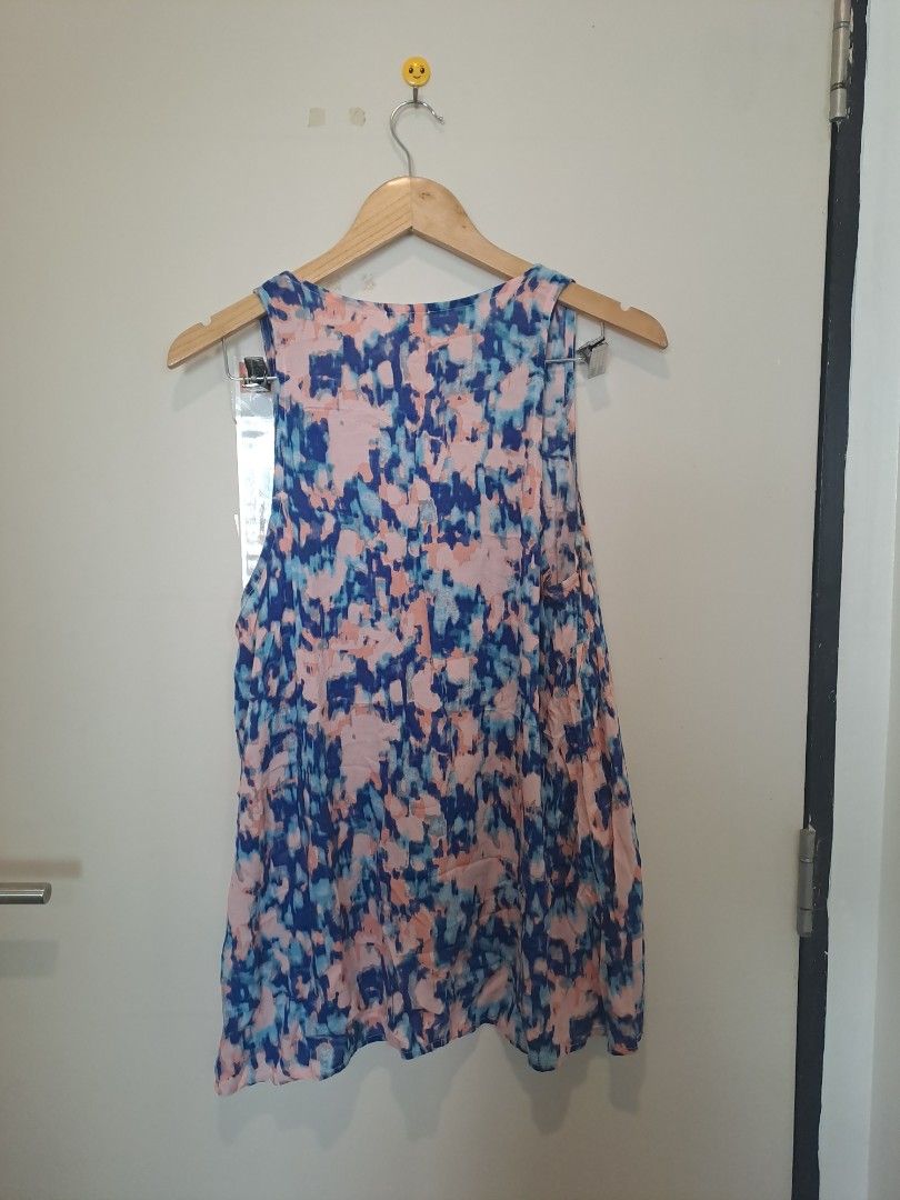 Splendid multicolored sleeveless (Category: Sleeveless) located in Manila. Submitted by joanbalde39643 (Listing ID 1466838655, Image 3). Description: This is a lightweight, sleeveless tank top by the brand Splendid, featuring a vibrant, painterly watercolor abstract print. The color palette combines shades of navy blue, soft blush pink, sky blue, and white in a brushstroke-style pattern rayon fabric large..