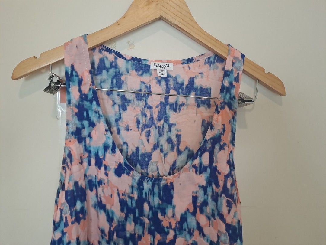 Splendid multicolored sleeveless (Category: Sleeveless) located in Manila. Submitted by joanbalde39643 (Listing ID 1466838655, Image 2). Description: This is a lightweight, sleeveless tank top by the brand Splendid, featuring a vibrant, painterly watercolor abstract print. The color palette combines shades of navy blue, soft blush pink, sky blue, and white in a brushstroke-style pattern rayon fabric large..