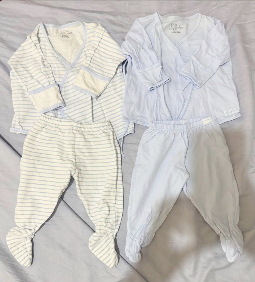 St. Patrick & H&M Ternos (Category: Babies & Kids Fashion) located in Makati City. Submitted by akimoie (Listing ID 1466783326, Image 1). Description: - Set of 3 newborn clothing sets (St. Patrick & H&M brands) - Includes blue striped top with footed pants, light blue top with footed pants, and solid white side-snap top with high-waisted pants - Made from ultra-soft cotton, gentle on baby's skin - Unisex bundle, great for newborn boys or girls - 
