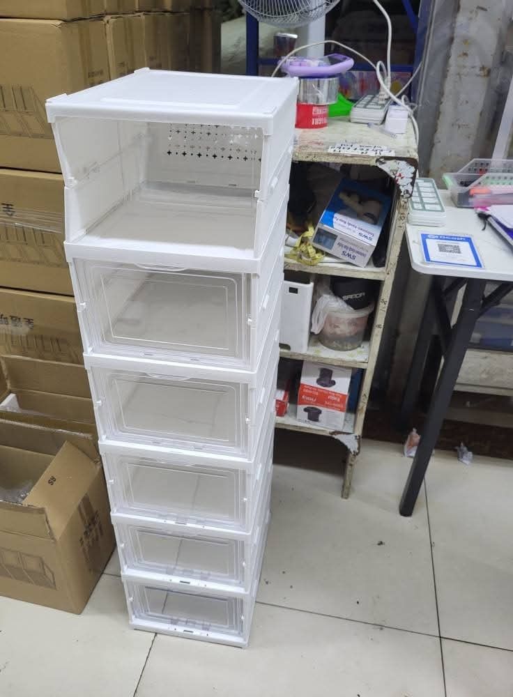 Stackable plastic shoe storage box organizer (Category: Storage Boxes & Baskets) located in Manila. Submitted by jamfrimzy089458 (Listing ID 1466835753, Image 1). Description: - Clear plastic shoe box with convenient drop-front door - Sturdy white frame structure with a stackable, space-saving design - Keeps your valuable sneakers dust-free and neatly organized - Fully collapsible unit that is easy to store when not in use - 6-tier total dimensio