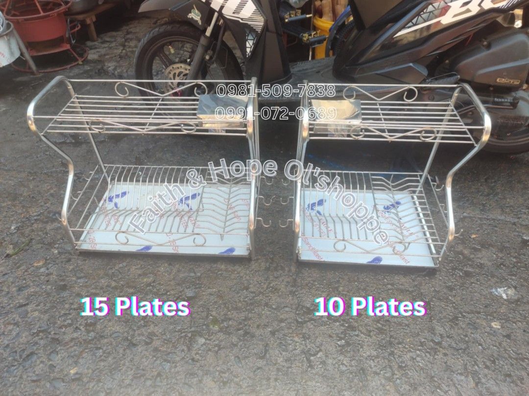 Stainless Steel 2-Tier Dish Drying Rack (Category: Food Organization & Storage) located in Manila. Submitted by jamfrimzy089458 (Listing ID 1466838462, Image 1). Description: - Material: Durable stainless steel wire construction - 2-Tier Design: Bottom tier securely holds plates, top tier fits cups, glasses, and mugs - Extra Storage: Includes a side attachment for cutlery and utensils, plus frame hooks - Mess-Free: Comes with a solid flat base tr
