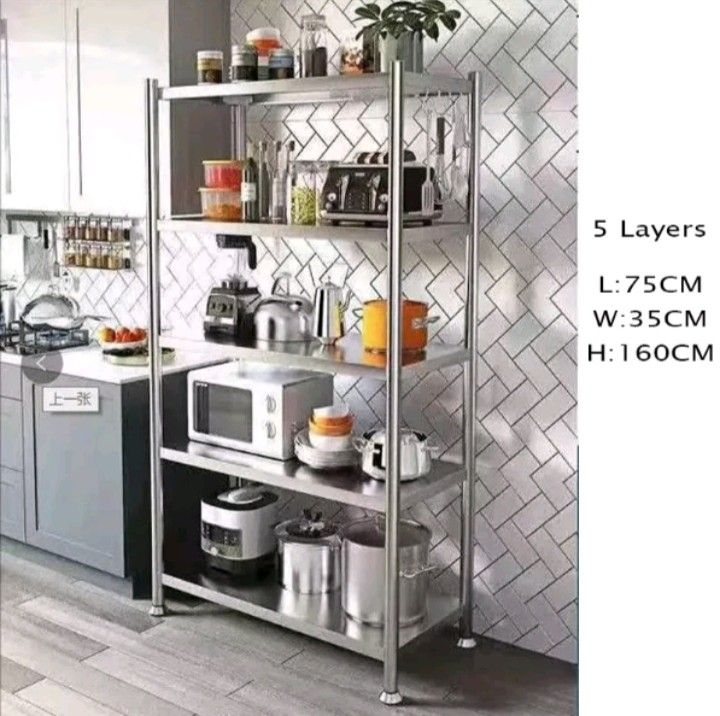 Stainless Steel Kitchen Storage Rack Multi-layer Microwave Oven Stand (Category: Shelves, Cabinets & Racks) located in Manila. Submitted by jamfrimzy089458 (Listing ID 1466825499, Image 1). Description: - Material: Sturdy stainless steel with a sleek silver finish - Multi-tier design: Easily holds microwaves, ovens, rice cookers, and heavy cooking pots - Open wire shelves: Keeps your appliances and cooking tools within easy reach - Stable & Durab