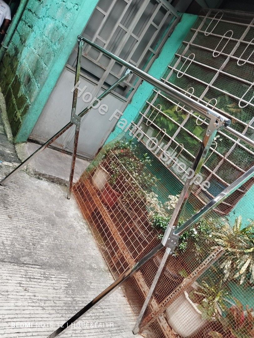 Stainless Steel X-Frame Clothes Drying Rack (Category: Clothes Drying Rack) located in Manila. Submitted by jamfrimzy089458 (Listing ID 1466835353, Image 3). Description: - Material: Durable, rust-resistant stainless steel - Design: Double top bars for extra hanging space and stable X-frame legs - Space-Saving: Fully foldable for easy and compact storage - Portable: Lightweight construction that is easy to move around - Versatile: Suitable for bo