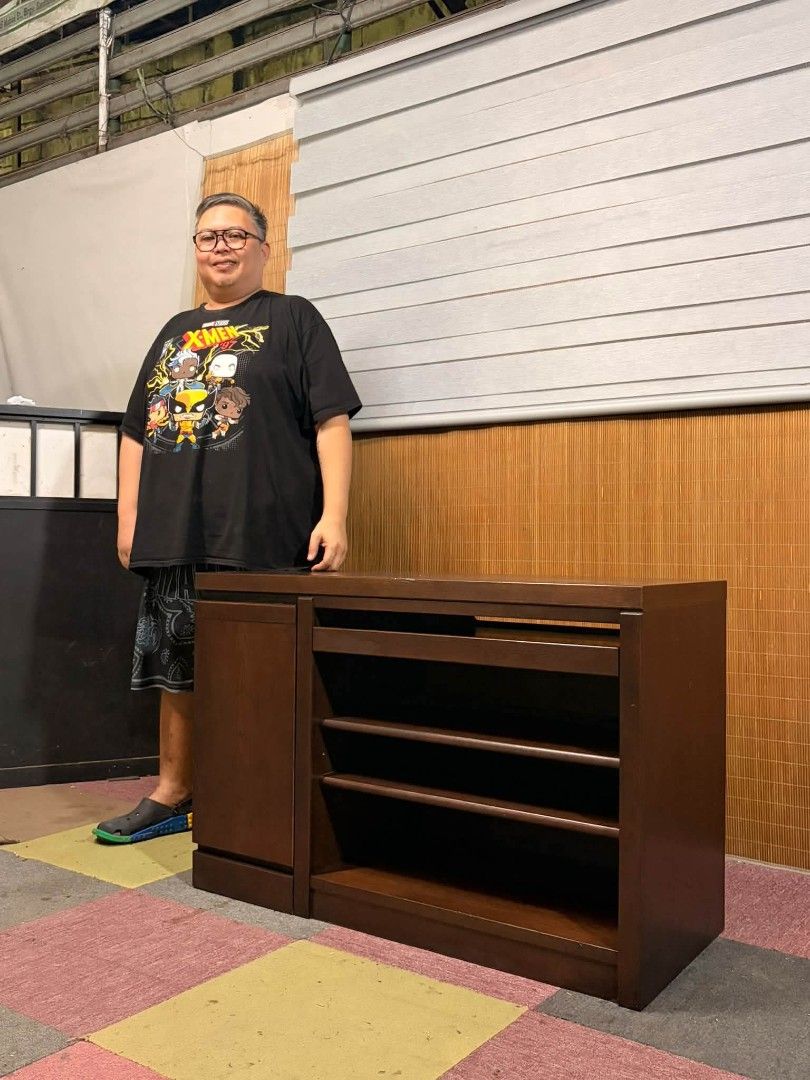 Storage Cabinet (Category: Shelves, Cabinets & Racks) located in Meycauayan. Submitted by marygracecasimiro (Listing ID 1466819321, Image 2). Description: SOLID WOOD Multi-Tier Console Storage Cabinet Adjustable Shelves, Pullout Shelf MABIGAT!!! SOLID TALAGA!!! Multi-purpose : Console for Entertainment Tv Rack / Tv Stand Kitchen Buffet Cabinet Price : 5900 ✅ 41L x 18W x 28H inches In VERY good condition🩷.