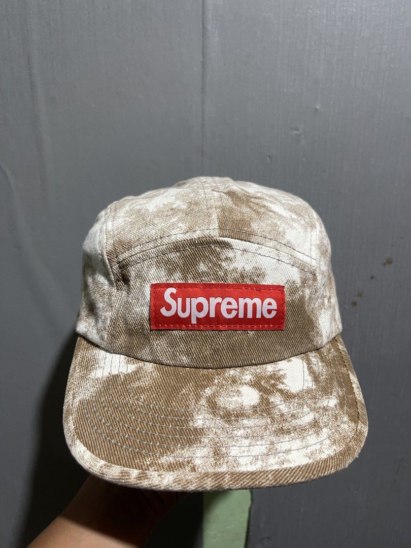 Supreme Bleached Canvas Camp Cap Brown FW24 (Category: Caps & Hats) located in Manila. Submitted by micoletszx81430 (Listing ID 1466800477, Image 1). Description: Supreme 5panel cap - Color: Brown with all-over bleached tie-dye wash effect - Iconic red box logo patch on front - Adjustable black nylon strap with Supreme-embossed buckle - Interior cotton sweatband with USA production tags - Clean structure, pristine and ready to wear.
