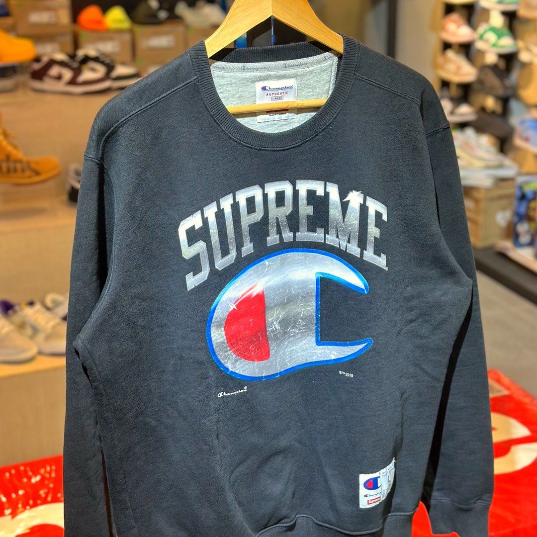 Supreme x Champion Chrome Crewneck (Category: Coats, Jackets and Outerwear) located in Quezon City. Submitted by inside_plug (Listing ID 1466835719, Image 2). Description: For sale Supreme x Champion Chrome Crewneck Black - Large Used Dm us to purchase.
