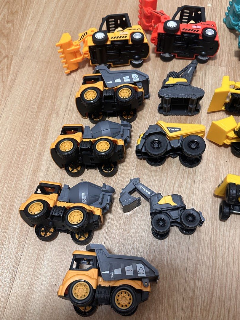 Take All Construction Toy Vehicles ( Trucks ) (Category: Kids Toys) located in Antipolo. Submitted by jloom (Listing ID 1466966027, Image 2). Description: - Massive construction toy vehicle bundle - Includes 3 forklifts (yellow, red, blue) - Features dump trucks, cement mixers, excavators, and bulldozers - Mix of authentic CAT and Volvo branded pieces plus others -.