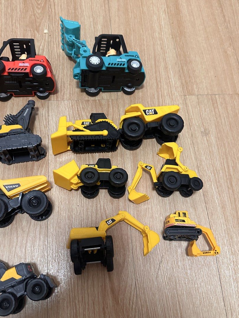 Take All Construction Toy Vehicles ( Trucks ) (Category: Kids Toys) located in Antipolo. Submitted by jloom (Listing ID 1466966027, Image 3). Description: - Massive construction toy vehicle bundle - Includes 3 forklifts (yellow, red, blue) - Features dump trucks, cement mixers, excavators, and bulldozers - Mix of authentic CAT and Volvo branded pieces plus others -.