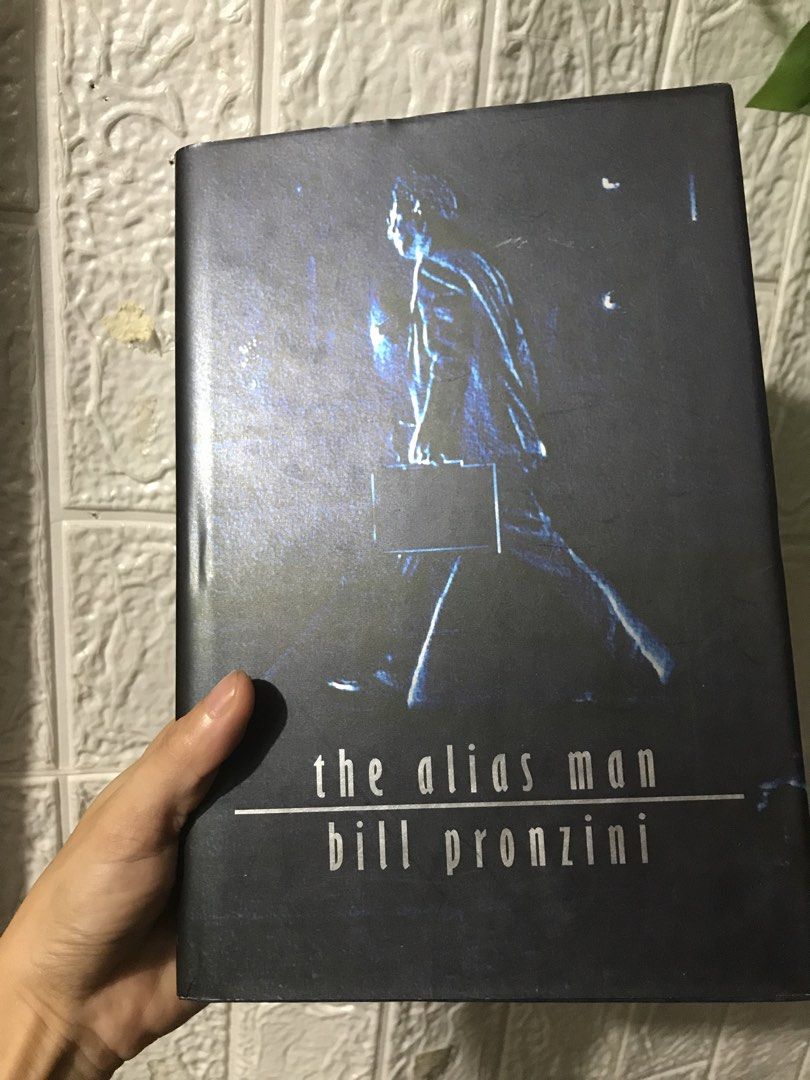 The Alias Man by Bill Pronzini Hardcover Book (Category: Storybooks) located in Pilar. Submitted by dhelsomera20308 (Listing ID 1466776857, Image 1). Description: - Title: Thriller novel by award-winning crime writer Bill Pronzini - Publisher: Walker & Company - Format: Hardcover with solid blue cloth spine and silver lettering - Art: Jacket illustration by Michael Seidman and design by Krystyna Skalski - Condition: Clean pages, great read for my