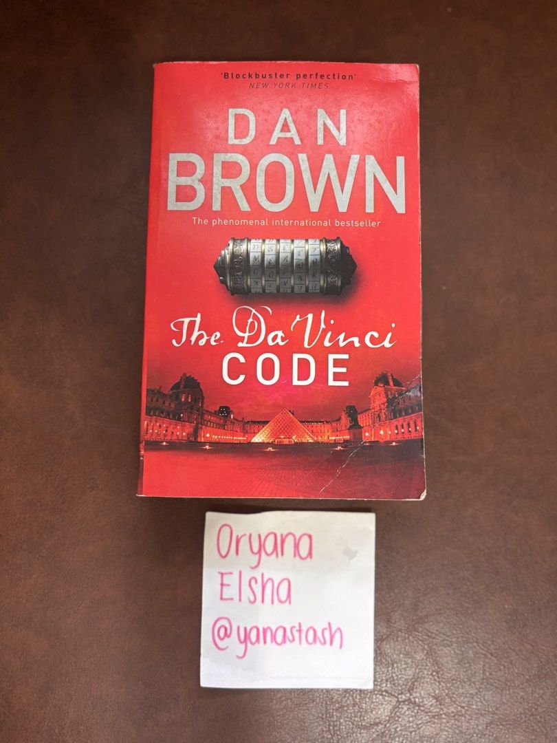 The Da Vinci Code by Dan Brown Novel Paperback (Category: Storybooks) located in Manila. Submitted by yanastash (Listing ID 1466810778, Image 2). Description: - Title: The Da Vinci Code by Dan Brown - Edition: Standard paperback with iconic red cover and Louvre pyramid graphic - Genre: Classic international bestseller, thriller, mystery, and historical fiction - Condition: Great read, perfect for collectors and book lovers 💳 MOP: PAYMENT FIRST •