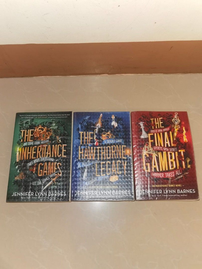 The Inheritance Games Trilogy Box Set Jennifer Lynn Barnes (Category: Storybooks) located in Manila. Submitted by coolmoon.6a41a1 (Listing ID 1466792014, Image 3). Description: - Set of 3 YA mystery books by Jennifer Lynn Barnes - Includes: The Inheritance Games, The Hawthorne Legacy, and The Final Gambit - Format: Paperback - Condition: Clean pages with intact spines - Full of puzzles, twists, and suspense.