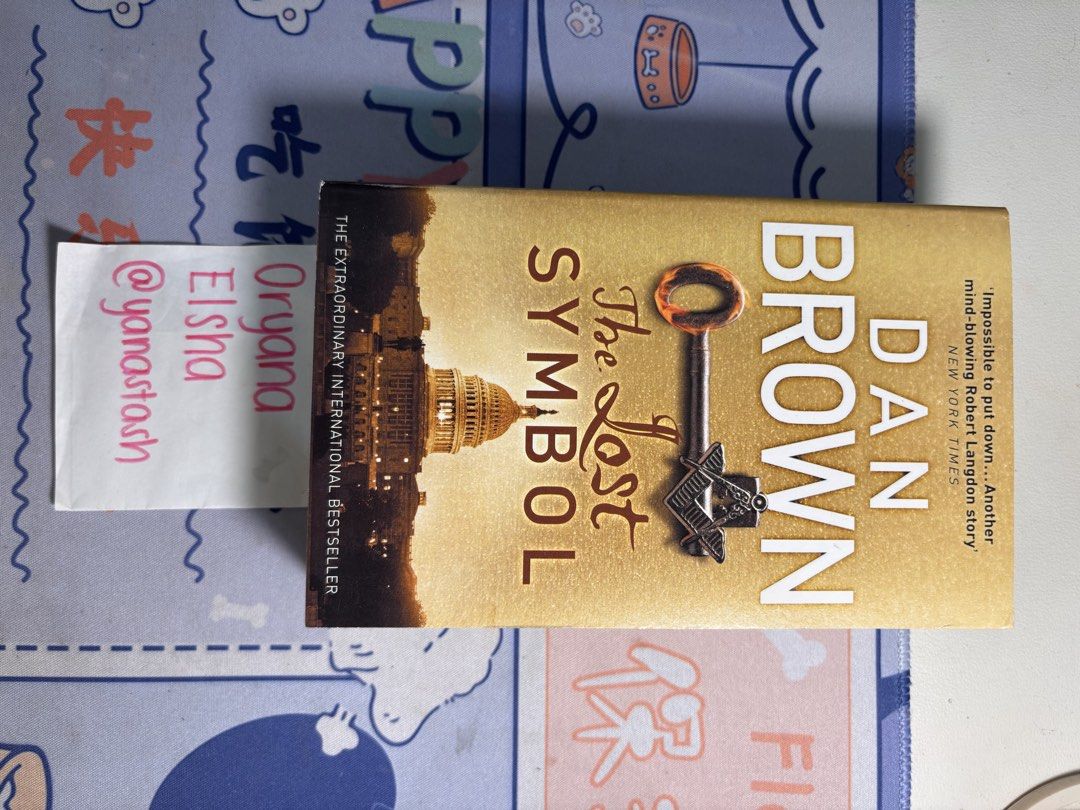 The Lost Symbol by Dan Brown Paperback (Category: Storybooks) located in Manila. Submitted by yanastash (Listing ID 1466810944, Image 2). Description: - Title: The Lost Symbol by Dan Brown - Format: Paperback - Series: Robert Langdon Series - Condition: Clean pages and solid spine - Perfect for: Mystery and thriller fans 💳 MOP: PAYMENT FIRST • GCash • BPI • GoTyme • MariBank 📦 SHIPPING / DELIVERY • Lalamove • GrabExpress • J&T • Other available