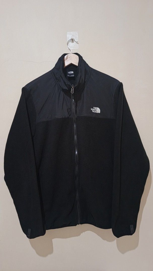 The North Face Black Fleece Jacket (Category: Coats, Jackets and Outerwear) located in Manila. Submitted by reysfindsph (Listing ID 1466935292, Image 1). Description: - Brand: The North Face - Style: Black fleece jacket with contrasting upper yoke - Size: US Men's L (Asia XL) - Features: Full zip closure, high collar, embroidered chest and back shoulder branding - Condition: Super warm layering piece for chilly days - Origin: Made in Vietnam.