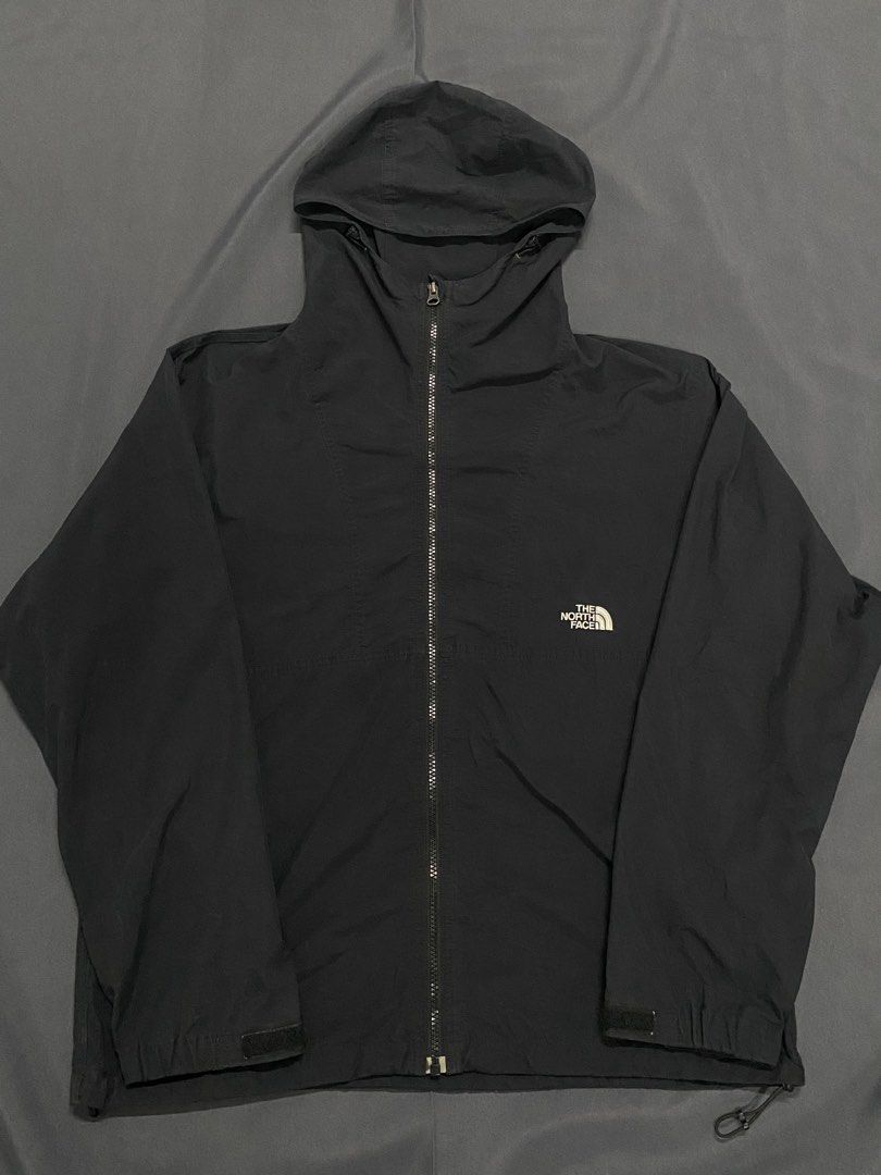 The North Face Black Nylon Windbreaker Jacket (Category: Coats, Jackets and Outerwear) located in Santa Maria. Submitted by saintarchive316 (Listing ID 1466889384, Image 1). Description: - Brand: The North Face - Model: NP21230 - Size: Medium - Color: Solid Black with subtle white logo - Material: 100% Nylon (lightweight & packable) - Features: Full zip front, attached hood, adjustable drawstrings at hood and hem, velcro cuffs, and Green Cycle in