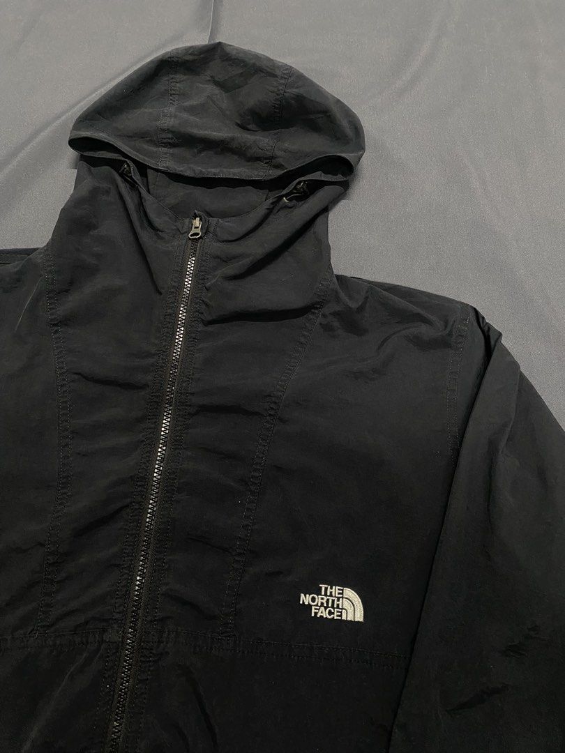 The North Face Black Nylon Windbreaker Jacket (Category: Coats, Jackets and Outerwear) located in Santa Maria. Submitted by saintarchive316 (Listing ID 1466889384, Image 2). Description: - Brand: The North Face - Model: NP21230 - Size: Medium - Color: Solid Black with subtle white logo - Material: 100% Nylon (lightweight & packable) - Features: Full zip front, attached hood, adjustable drawstrings at hood and hem, velcro cuffs, and Green Cycle in