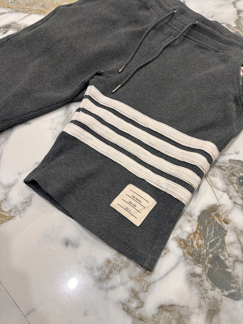 Thom Browne Waffle Knit aspack (Category: Shorts) located in Cavite. Submitted by gelloots (Listing ID 1466884715, Image 3). Description: Grey:details Dimes: 30 to 38x19.5 Condition : Good Condition Color rate : 9.5/10 Size on tag: 3 Wash Navy blue: Dimes: 28 to 34x19.5 Condition : Good Condition Color rate : 9.5/10 Size on tag: 0 Wash.