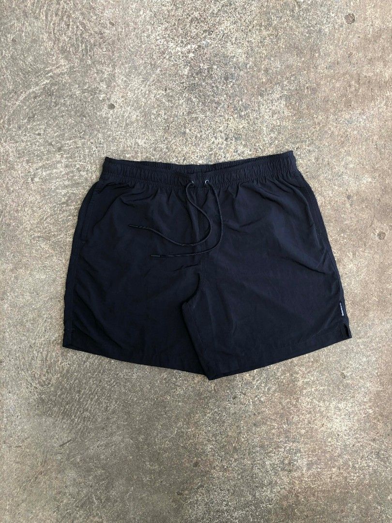 Timberland Black Board Shorts XL (Category: Swim Trunks & Board Shorts) located in Sipalay. Submitted by yon.thrifter (Listing ID 1466774545, Image 1). Description: - Brand: Timberland - Size: XL - Color: Classic Black - Material: Lightweight nylon shell with breathable mesh lining - Waistband: Elastic with adjustable drawstring - Pockets: 2 side pockets + 1 back pocket with Timberland logo patch - Condition: Excellent / Pre-loved - Versatile: Gr