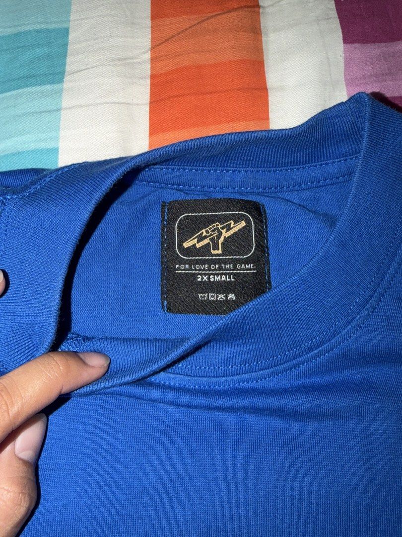 Titan Shirt (Category: Shirts) located in San Pedro. Submitted by lovedbymeclothes (Listing ID 1466928347, Image 2). Description: Size 2xs on tag but fits Small to semi large women No issue used twice only bought from titan nuvali.