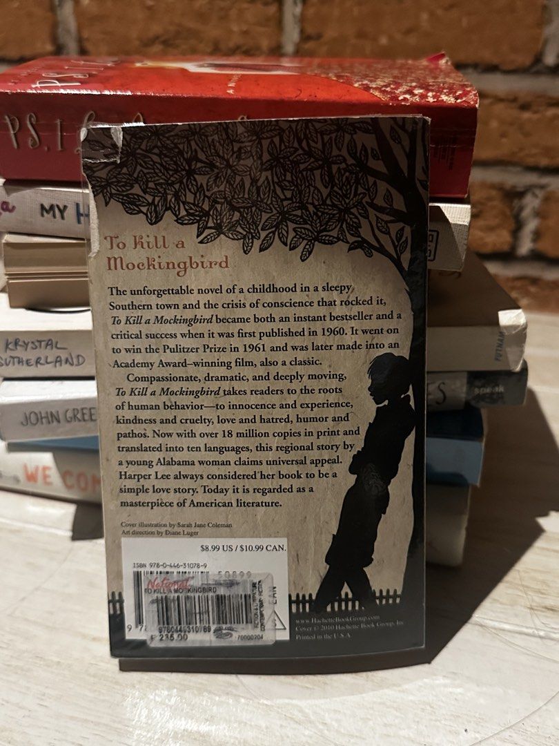 To Kill a Mockingbird by Harper Lee Paperback (Category: Storybooks) located in Antipolo. Submitted by by.sophia (Listing ID 1466886819, Image 2). Description: - Title: To Kill a Mockingbird by Harper Lee - Format: Paperback edition - Accolades: Winner of the Pulitzer Prize - Cover Art: Designed by Sarah Jane Coleman and Diane Luger - Condition: Stored in protective plastic wrap, original retail price on back - Ideal For: Literature enthusiasts a